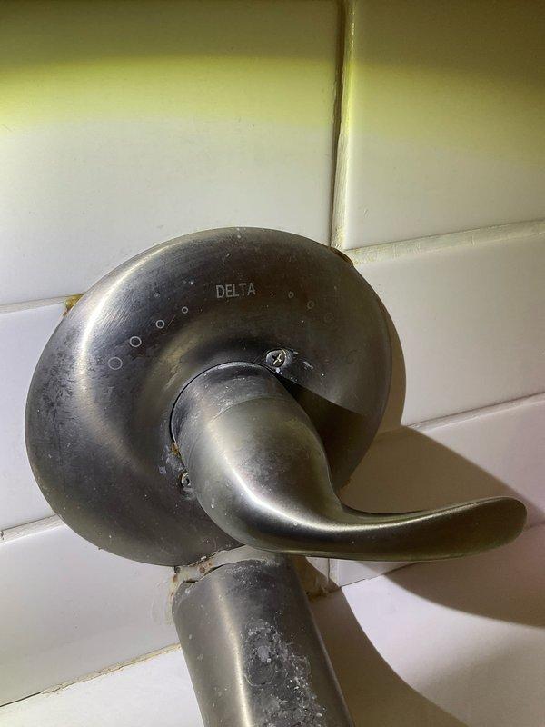 Responded to low/no water pressure complaint and performed comprehensive plumbing assessment. Repaired garbage disposal to restore proper function and verified dishwasher connection integrity. Addressed bathroom sink water pressure issue and completed installation of new bathroom fixtures, including Delta shower valve assembly and tub spout fixture mounted on tiled surfaces. All fixtures tested and confirmed operational upon completion.