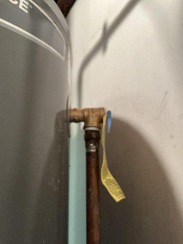 Installed 3/4" pressure reducing valve and 4.5-gallon expansion tank to regulate incoming water pressure and protect the plumbing system from thermal expansion. Replaced water heater temperature and pressure relief valve rated at 150 PSI for 100,000 BTU capacity, verified proper operation and tested for leaks throughout the system. Reworked water heater venting configuration to improve updraft and eliminate hot gas backdraft issues, utilizing ProPress lead-free copper fittings including 3/4" couplings and tees for secure connections. Tested and confirmed system pressure levels are within acceptable range and addressed knocking pipe concerns affecting upstairs unit.