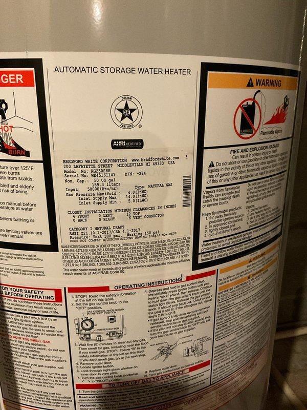 Responded to service call for Bradford White natural gas water heater experiencing intermittent shutdowns. Upon arrival, performed comprehensive diagnostic inspection of the unit, including examination of the burner assembly, thermocouple, gas control valve, and venting system. Verified proper gas supply and pressure to the appliance. Inspected the Defender Safety System components and tested thermal cutoff switch functionality. Checked all electrical connections and pilot assembly for proper operation. Documented equipment specifications including 50,000 BTU/HR input capacity and current installation configuration with copper supply lines and shutoff valves. Unit showed no active fault conditions during service visit. Provided operational guidance and recommendations for monitoring system performance.