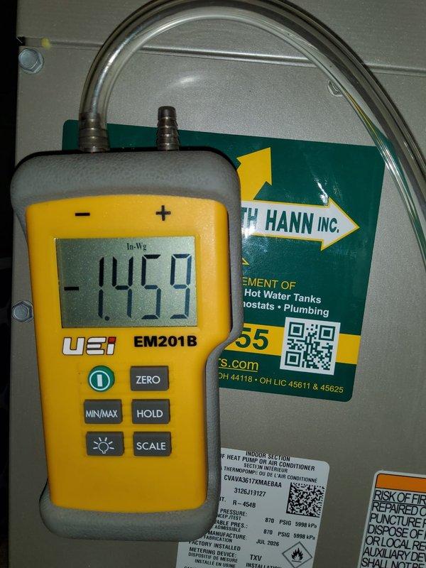 Completed full HVAC system installation including new furnace with evaporator coil, two-stage air conditioning unit, and Ecobee smart thermostat. The furnace was installed in the basement utility area with proper PVC venting for condensate drainage and combustion air intake/exhaust. All ductwork connections were secured, electrical wiring completed to code, and system commissioned with pressure testing showing optimal readings. The installation provides efficient climate control with smart thermostat integration for enhanced energy management.