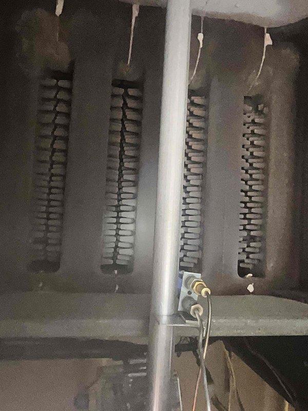Completed annual preventative maintenance on 26-year-old gas furnace located in basement. Performed comprehensive tune-up including inspection of heat exchanger coils, burner assembly, and blower components. Verified proper system operation with no reported issues or abnormalities detected during service call.