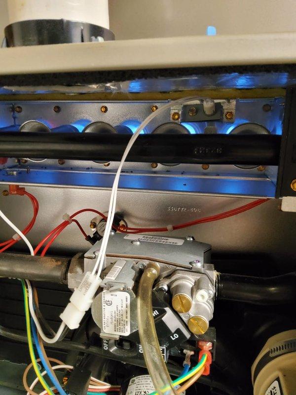Performed comprehensive preventive maintenance on a 3-year-old gas-powered furnace system. Conducted combustion analysis using Testo 310 analyzer, recording carbon monoxide levels at 31 ppm and flue temperature of 12.5°C. Inspected burner assembly, gas valve operation, ignition system, and flame characteristics—all burners firing properly with consistent blue flames across all ports. Verified proper operation of safety controls, electrical connections, and gas valve assembly. System operating within normal parameters; maintenance contract renewed for continued service coverage.
