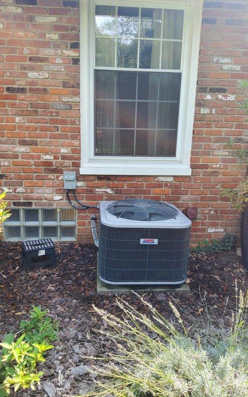 Completed scheduled maintenance on an 8-year-old residential cooling system. Performed comprehensive inspection of indoor furnace unit located in basement and outdoor cylindrical condenser unit with horizontal louver design. Verified proper operation of all components, checked refrigerant levels, inspected electrical connections and disconnect box, examined ductwork connections and insulation integrity, and ensured system is operating efficiently for the cooling season.
