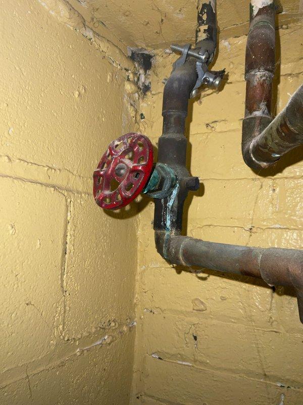 Responded to service call for active water leak on existing tanked water heater. Upon inspection, identified slow leak from aging water heater unit with visible corrosion on piping connections and deteriorated valve components. Assessed installation showing considerable age with oxidized copper supply lines, corroded gas piping, and weathered exhaust venting. Documented existing conditions including compromised pipe fittings, mineral deposits, and general wear on plumbing infrastructure. Evaluated water heater tank integrity and connection points to determine source of active leak and provided customer with findings and repair recommendations.