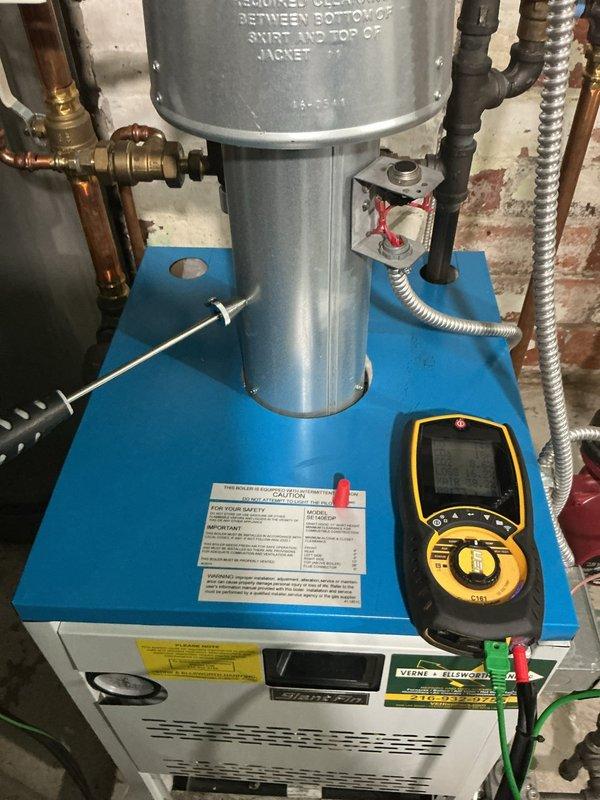 Performed comprehensive maintenance and repair on boiler system. Thoroughly brushed and cleaned all accessible components, resealed boiler to ensure proper containment and prevent leaks, and conducted complete combustion analysis testing. Post-service combustion readings confirmed optimal performance with CO levels at 17 ppm, CO2 at 8.8%, efficiency loss at 16.3%, and excess air at 34.9%, verifying safe and efficient operation of the heating system.