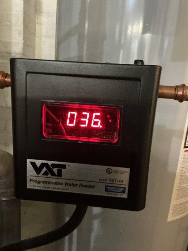 Performed scheduled maintenance on a 9-year-old gas-fired steam boiler system. Inspected and tested the VXT-24 programmable water feeder, which displayed proper operation with digital readout functioning correctly. Verified all copper piping connections, evaluated the integrated water heater system, and confirmed proper operation of all mechanical components and controls throughout the heating system.