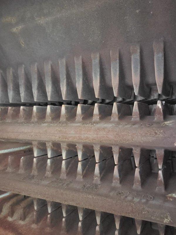 Performed annual boiler maintenance and tune-up on basement-installed unit of unknown age. System was operating normally with no reported issues at time of service. Inspection revealed significant dust and debris accumulation on heat exchanger fins and internal components, which was documented photographically for service records.