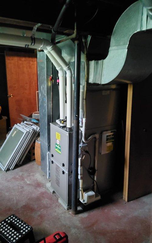 Completed comprehensive tune-up and inspection on 8-year-old furnace system with no reported issues. Performed full system diagnostics, inspected heat exchanger, burner assembly, and flame sensor, verified proper operation of blower motor and capacitor, checked all electrical connections and control board functionality, tested condensate pump and drainage system, inspected and confirmed proper venting through PVC exhaust piping, measured temperature rise and combustion efficiency within manufacturer specifications, and documented equipment condition with photos. All components operating normally with no safety concerns identified.