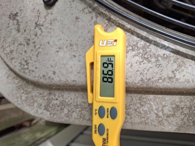 Performed routine air conditioner maintenance on a five-year-old system that was operating properly with no reported issues. Conducted comprehensive tune-up procedures including temperature differential measurements across the evaporator coil, recording supply air temperature of 46.93°F and return air temperature of 80.7°F, indicating proper system performance and adequate cooling capacity. System inspection confirmed all components functioning within normal operating parameters.