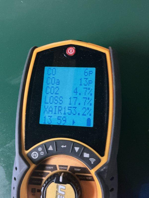 Completed annual boiler maintenance and tune-up on an 8-year-old heating system per membership agreement. Performed comprehensive combustion analysis using digital analyzer, which revealed CO levels at 6 ppm, CO2 at 4.7%, and flue loss at 17.7% with excess air at 153.2%, indicating acceptable operating parameters within manufacturer specifications. All safety checks passed and system operating efficiently.