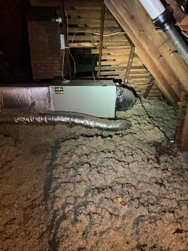 Conducted estimate for complete HVAC system replacement including air conditioning condensing unit and air handler. Inspected existing attic-mounted air handler installation with connected flexible ductwork and assessed equipment condition. Completed yard placement worksheet documenting all required measurements and setback distances for proposed outdoor condensing unit location in compliance with municipal placement requirements and ANSI/AHRI sound rating specifications.