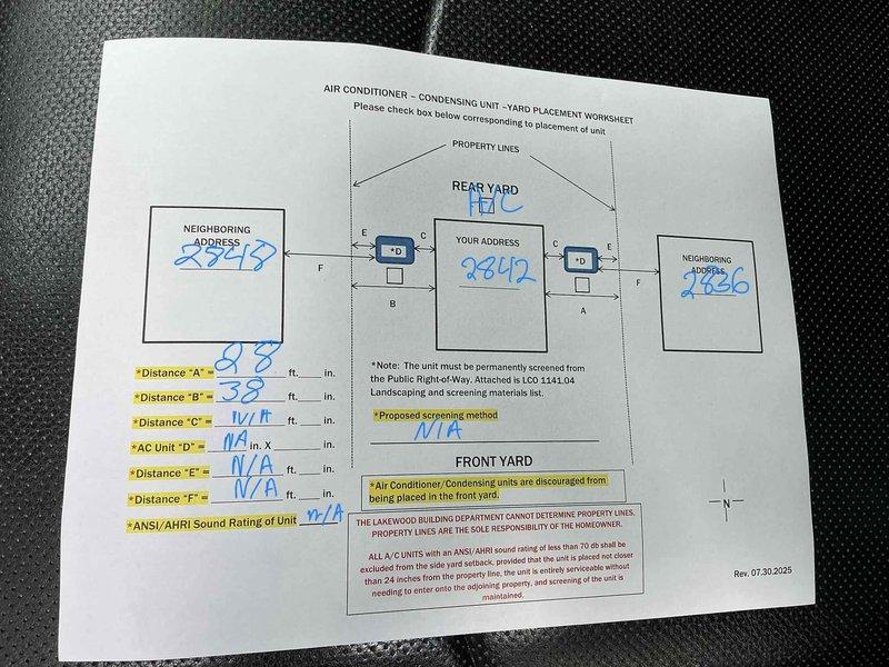 Conducted estimate for complete HVAC system replacement including air conditioning condensing unit and air handler. Inspected existing attic-mounted air handler installation with connected flexible ductwork and assessed equipment condition. Completed yard placement worksheet documenting all required measurements and setback distances for proposed outdoor condensing unit location in compliance with municipal placement requirements and ANSI/AHRI sound rating specifications.