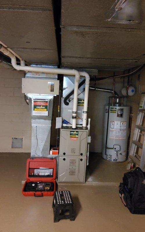 Completed comprehensive fall tune-up on residential forced-air furnace system manufactured in April 2023. Performed standard preventive maintenance protocol including visual inspection of all accessible components, verification of proper combustion and venting through white PVC condensate lines, electrical system testing at 115V/60Hz/1-phase specifications, and confirmation of operational parameters within manufacturer specifications per AHRI certification requirements. All equipment found operating within normal parameters with no deficiencies noted; system ready for heating season under active membership maintenance agreement.