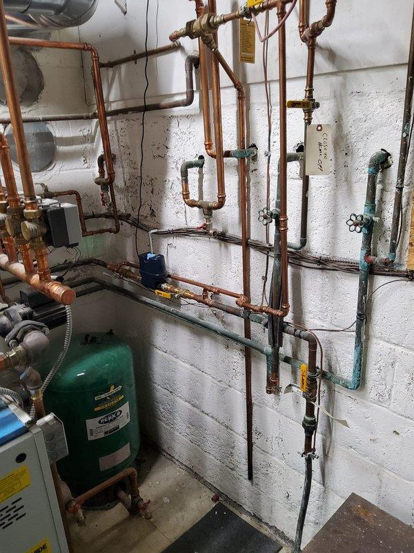 Completed diagnostic service on residential plumbing system. Assessed main water line and determined need for pressure reducing valve installation on incoming water supply. Evaluated existing piping configuration in mechanical room, including copper supply lines, shut-off valves, and distribution network. Inspected exterior spigot and confirmed replacement required due to wear or malfunction. Provided quote for pressure reducing valve installation and outdoor spigot replacement. Customer rescheduled appointment and was advised to confirm service timing to ensure proper scheduling coordination.