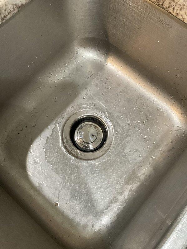 Removed existing Insinkerator garbage disposal unit from under-sink mounting assembly and disconnected all plumbing connections and electrical supply. Installed new Insinkerator disposal unit, securing it to the sink flange with proper mounting hardware, reconnecting drain lines and restoring power connection. Tested unit for proper operation, verified no leaks at connections, and confirmed drain functionality through the disposal and sink basin.