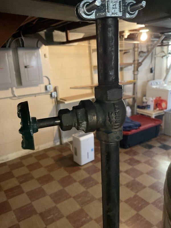 Performed routine maintenance on tanked water heater in basement mechanical room. Inspected all plumbing connections, valves, and pipe assemblies for proper operation and signs of wear. Verified valve functionality and checked mounting hardware for secure installation. System found to be operating within normal parameters with all components functioning as designed.