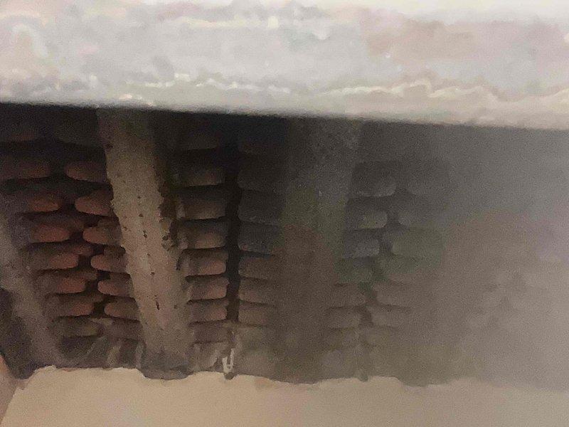 Performed annual maintenance on 20-year-old boiler system. Conducted combustion analysis using digital analyzer, confirming CO levels at 0.22% and O2 at 20.64% with flue temperature reading of 95.7°F. Inspected and verified proper operation of soffit ventilation system to ensure adequate combustion air supply for continued safe boiler operation.
