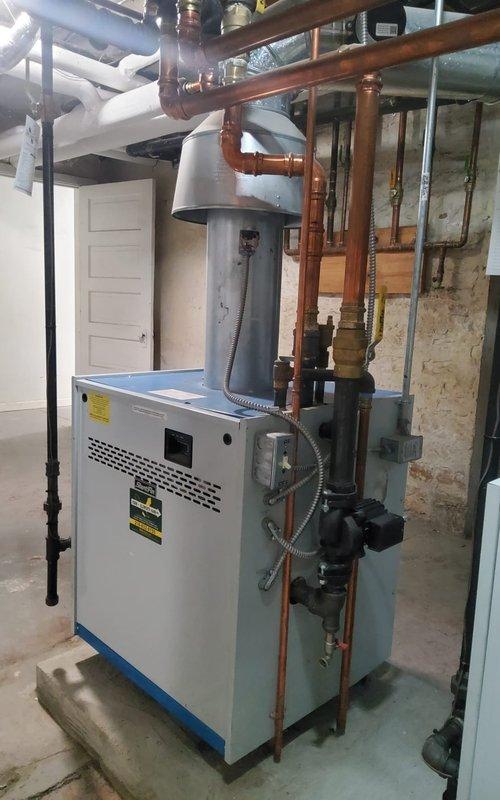 Completed comprehensive preventive maintenance on dual gas boiler heating system. Performed thorough inspection of both boiler units, including burner assemblies, heat exchangers, ignition systems, and safety controls. Verified proper operation of digital control panels and temperature settings on each unit. Inspected and tested all copper piping connections, expansion tanks, circulation components, and zone valves throughout the hydronic heating system. Checked gas pressure, combustion efficiency, and venting systems to ensure optimal performance and safe operation. All components found to be functioning within manufacturer specifications, and both boilers are operating efficiently for continued reliable heating service.