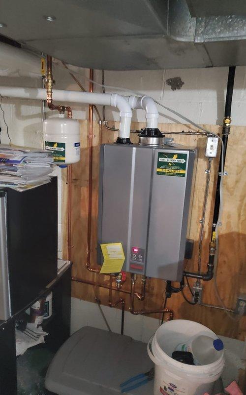Completed routine maintenance tune-up on 13-year-old furnace and 4-year-old tankless water heater, both operating properly at time of service. Performed standard furnace inspection including filter replacement, burner cleaning, flame sensor maintenance, blower motor lubrication, and combustion analysis to ensure optimal efficiency. Descaled tankless water heater by flushing system with descaling solution to remove mineral buildup, cleaned inlet filter screen, inspected heat exchanger, and verified proper flow rates and temperature differential. Tested all safety controls, confirmed proper venting on both units, and verified gas pressures within manufacturer specifications. All equipment left in good working condition with no issues identified.