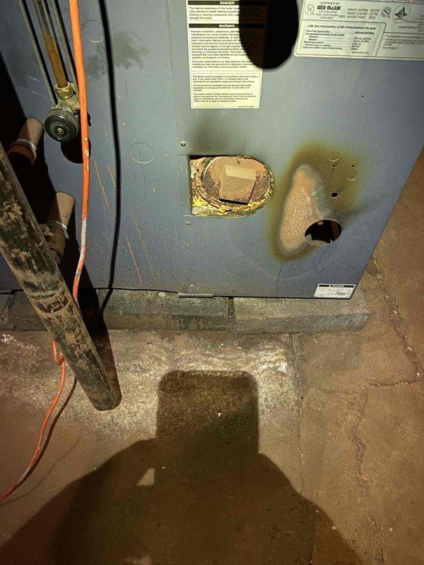 Responded to service call for boiler operating at partial capacity. Upon inspection, found dual-section boiler system with one section not firing properly. Examined electrical connections, gas valves, and control systems on the affected section. Verified gas supply to both zones and inspected burner assembly access panels for proper operation. Documented equipment condition including wiring configuration, gas valve controls with identification labels, and overall system setup for further diagnostic evaluation and repair recommendations.