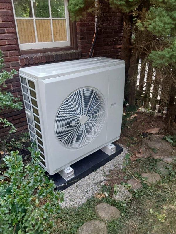 Completed full HVAC system replacement, removing existing equipment and installing new heat pump system with outdoor condensing unit and indoor air handler. The outdoor heat pump was positioned on composite pad with proper clearances against brick exterior, with refrigerant lines routed along exterior wall to attic penetration. In the attic space, installed new air handler on insulated platform with connections to existing ductwork system, ran condensate drain line via PVC piping, completed refrigerant line connections with proper insulation, and integrated Ecobee smart thermostat for system control. All electrical connections were made to code, system was pressure tested, evacuated, and charged to manufacturer specifications. Verified proper airflow through all zones and confirmed heating and cooling operation across all system modes.