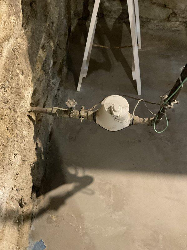Reconnected basement utility sink to existing plumbing infrastructure, restoring full functionality to the wash basin. All supply lines and drainage connections were properly secured and tested for leaks, with the installation verified to be operating correctly.