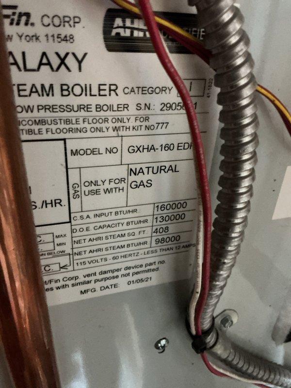 Completed scheduled maintenance on a Weil-McLain Galaxy GXHA-160 EDI steam boiler, manufactured January 2021, operating on natural gas with 160,000 BTU/HR input capacity. Performed comprehensive tune-up including inspection of all operating controls, pressure gauge verification, safety valve testing, and examination of copper piping connections and electrical components. Unit was found operating properly with no deficiencies noted; all components functioning within manufacturer specifications at time of service.