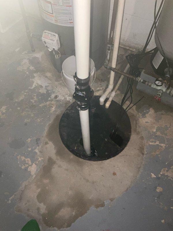Upgraded existing 1/3 horsepower sump pump system to a more robust 1/2 horsepower unit to improve water removal capacity in basement utility area. Completed installation with proper PVC discharge piping configuration and electrical connections, ensuring optimal pump performance and protection against basement flooding.