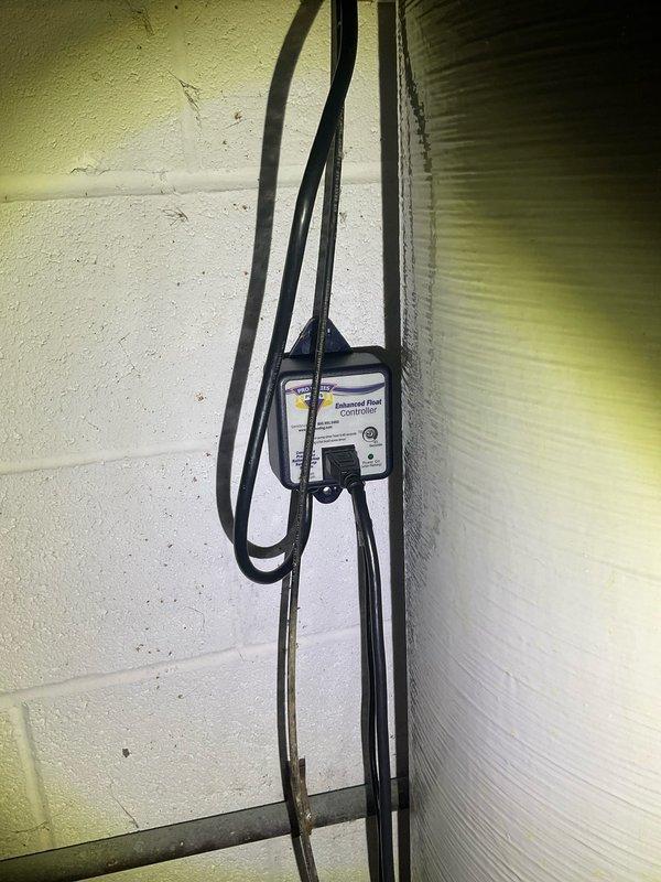 Upgraded existing 1/3 horsepower sump pump system to a more robust 1/2 horsepower unit to improve water removal capacity in basement utility area. Completed installation with proper PVC discharge piping configuration and electrical connections, ensuring optimal pump performance and protection against basement flooding.