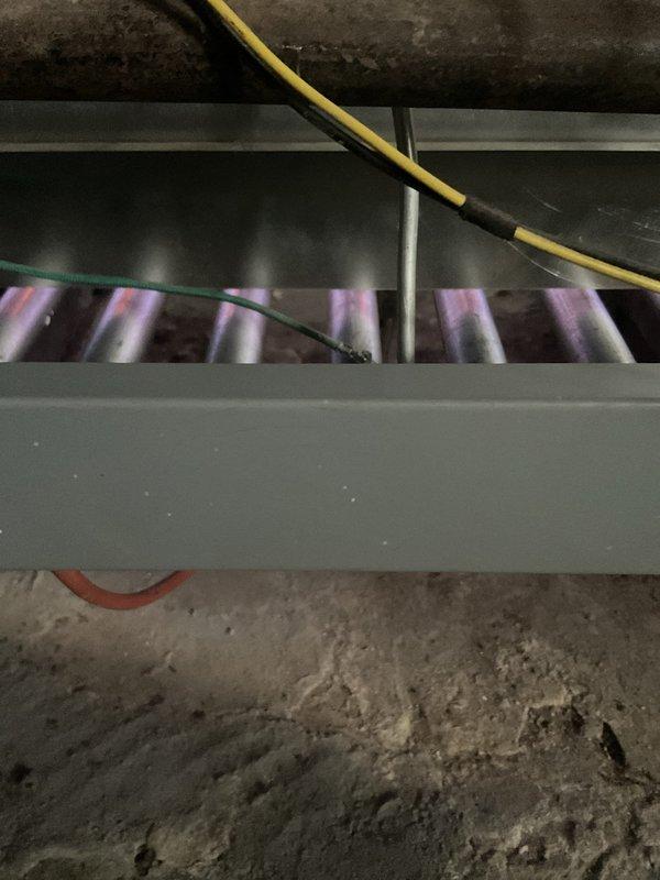 Completed comprehensive tune-up on a 10-year-old gas furnace located in basement. Performed full system inspection including burner assembly operation verification, heat exchanger examination, and combustion analysis. All burners igniting properly with appropriate flame characteristics showing blue/purple coloration indicating efficient combustion. Heat exchanger inspected and found to be in serviceable condition with no visible cracks or deterioration. System operational and ready for heating season.