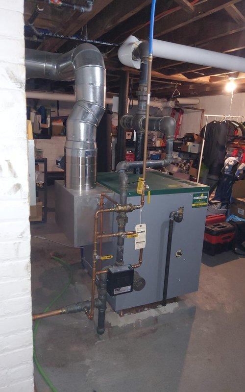 Performed annual boiler maintenance and tune-up on residential heating system. Conducted comprehensive combustion analysis using digital analyzer, measuring oxygen levels, carbon monoxide, carbon dioxide, flue gas temperatures, and overall combustion efficiency to ensure safe and optimal operation. Inspected boiler unit, copper piping connections, valves, fittings, and ductwork system; all components found operating within normal parameters and system performing efficiently.