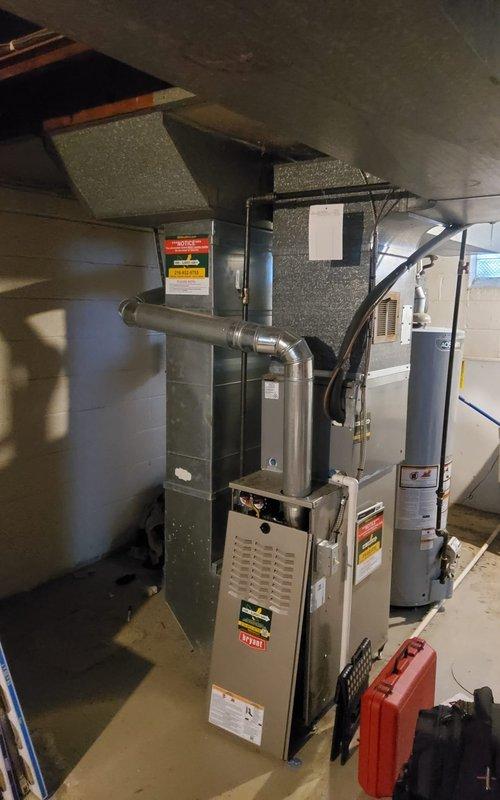 Completed scheduled maintenance on 14-year-old gas furnace and 2-year-old air conditioning system. Performed comprehensive tune-up procedures including filter inspection, burner assembly cleaning, heat exchanger examination, blower motor lubrication, thermostat calibration, refrigerant level verification, condenser coil cleaning, and electrical connection testing. Both systems found to be operating within manufacturer specifications with no immediate repairs required.