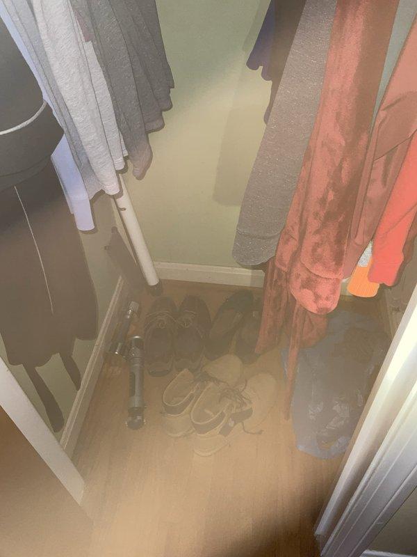 Responded to water leak complaint in downstairs half bath with ceiling damage. Upon investigation, traced leak source to upstairs closet area where carpet showed significant water staining and discoloration. Inspected bathroom vanity plumbing connections, P-trap assembly, and supply lines for potential failure points in the fifty-year-old home's plumbing system.