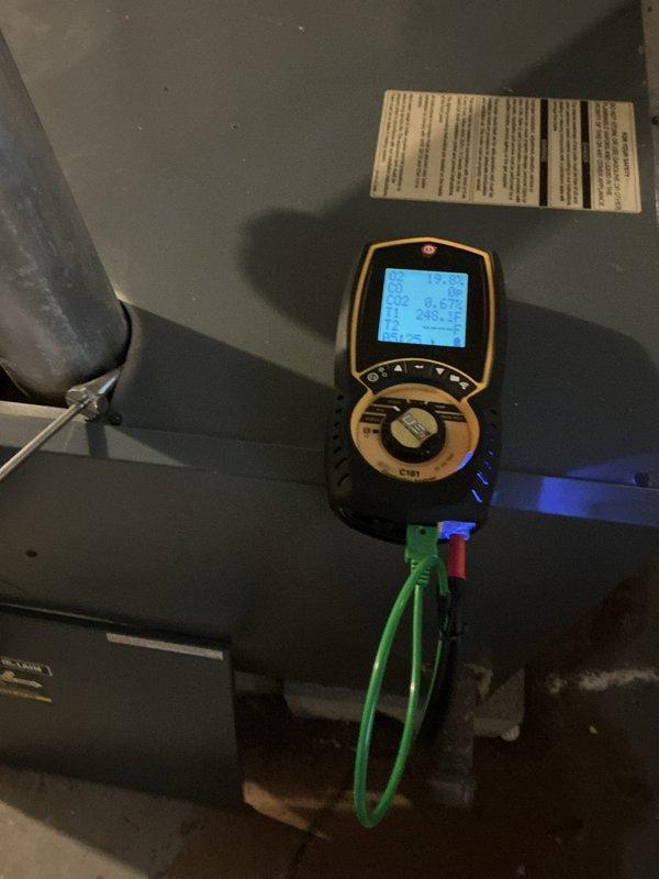 Completed annual maintenance and tune-up on 8-year-old boiler system per membership agreement. Performed comprehensive inspection of heat exchanger, burner assembly, gas valve components, and all electrical connections. Conducted combustion analysis testing using diagnostic meter to verify proper gas pressure, temperature readings, and system efficiency. Inspected finned heat exchanger plates for signs of deterioration or carbon buildup, confirmed condensate drain pan and PVC drainage lines were clear and functioning properly. All components found to be operating within manufacturer specifications with no immediate safety concerns or repair needs identified at this time.