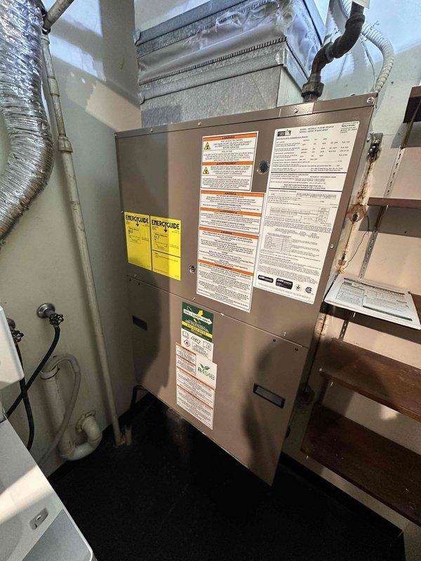 Completed full packaged HVAC system replacement including new air handler unit and digital thermostat. Verified proper installation with static pressure readings of 15.0 using calibrated UEi EM152 manometer, confirmed all ductwork connections are secure, and ensured unit is operating within manufacturer specifications with all safety labels and energy guide documentation properly affixed.