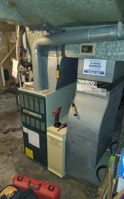 Completed comprehensive heat pump and furnace tune-up maintenance service at residential property after confirming appointment scheduling. Performed full system inspection of HVAC equipment located in basement utility area, including furnace unit and HAVSCO air handling system. Conducted standard preventive maintenance procedures, verified all electrical connections, inspected ductwork connections, and ensured proper operation of both heating components for optimal winter performance.