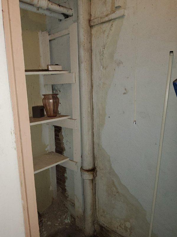 Responded to service call for broken toilet handle replacement. Upon arrival, conducted comprehensive plumbing assessment of property as requested. Documented extensive water damage and deterioration to basement ceiling area, including significant rust staining on white PVC and copper piping, compromised ceiling material with exposed structural beams, and evidence of long-term moisture intrusion affecting multiple pipe runs and cleanout fittings. Photographed conditions for record and recommended further evaluation of water damage source and structural concerns.