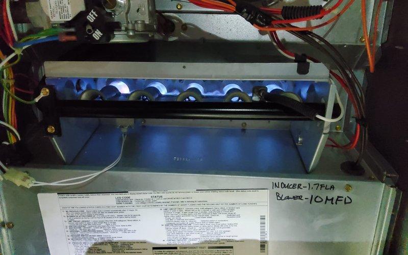 Responded to no heat call for furnace that would not start despite recent service visit. Upon arrival, found unit powered off at electrical disconnect switch mounted near furnace. Restored power to unit by switching disconnect to ON position. Verified furnace startup sequence, observed inducer motor operation, confirmed ignition system functioning properly, and witnessed successful burner ignition with proper blue flame pattern across all six burners. Tested system through complete heating cycle to ensure proper operation. Advised customer on location and function of emergency disconnect switch to prevent future inadvertent shutoffs.
