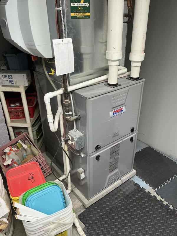 Conducted estimate for replacement of 15-year-old residential furnace unit found to be in poor condition. Assessed existing gray metal furnace system with associated PVC venting and condensate drainage lines, along with connected ductwork and humidification components in basement mechanical room. Documented equipment condition through photos and provided replacement recommendations to customer.