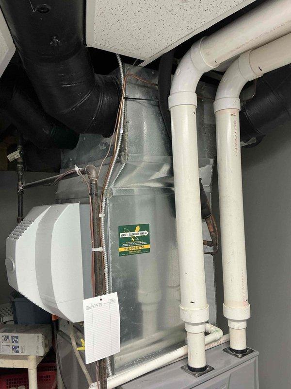 Conducted estimate for replacement of 15-year-old residential furnace unit found to be in poor condition. Assessed existing gray metal furnace system with associated PVC venting and condensate drainage lines, along with connected ductwork and humidification components in basement mechanical room. Documented equipment condition through photos and provided replacement recommendations to customer.