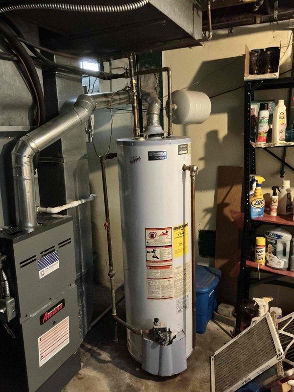 Conducted comprehensive evaluation of 25-year-old HVAC system experiencing circuit breaker tripping issues. Inspected furnace, evaporator coil unit manufactured by International Comfort Products, and associated electrical components in basement mechanical room. Documented existing equipment condition and electrical concerns, provided detailed replacement estimate for aging system showing signs of potential electrical failure.