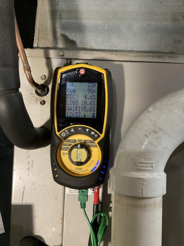 # HVAC Maintenance - Heating System Service

Performed comprehensive heating maintenance on a 3-year-old gas furnace. Conducted combustion analysis using diagnostic equipment, recording CO2 levels at 3.0%, oxygen levels at 18.8%, and stack air temperature at 195.6°F. Inspected burner assembly and confirmed proper flame characteristics with clean blue flames across all burner ports. Verified gas valve operation, checked electrical connections and wiring harnesses, and examined venting components including PVC exhaust piping. All system components found operating within normal parameters with proper combustion efficiency maintained.