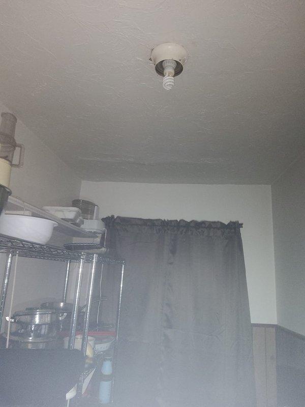 Responded to upstairs unit for leaking steam pipes and malfunctioning shower diverter handle. Inspected steam radiator system and identified leak source at pipe connections. Addressed shower diverter mechanism that controls water flow between tub spout and showerhead, which was not engaging properly. Protected work area with floor coverings during repairs to prevent water damage.