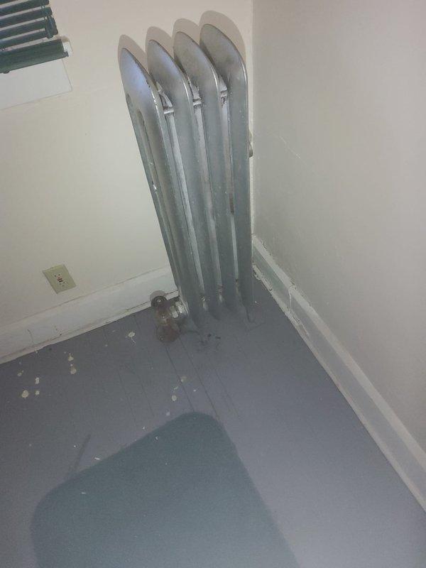 Responded to upstairs unit for leaking steam pipes and malfunctioning shower diverter handle. Inspected steam radiator system and identified leak source at pipe connections. Addressed shower diverter mechanism that controls water flow between tub spout and showerhead, which was not engaging properly. Protected work area with floor coverings during repairs to prevent water damage.