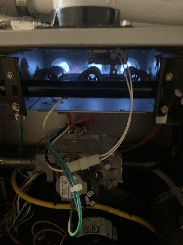 Completed comprehensive tune-up on 10-year-old gas furnace operating without reported issues. Performed full system inspection including burner operation verification, flame sensor cleaning, and combustion analysis. Confirmed proper blue flame pattern across all burner ports indicating optimal gas-air mixture. Inspected and tested all electrical connections, control wiring, and safety switches. Checked blower motor operation, measured static pressure in duct system, and verified proper airflow. All components found operating within manufacturer specifications with no immediate service needs identified.