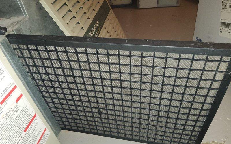 Responded to service call for 30-year-old furnace running but not producing heat, with temperature stuck at 68 degrees. Inspected unit in basement, identified clogged air filter restricting airflow and preventing proper heat distribution. Replaced dirty filter with new unit, restored system to normal heating operation.