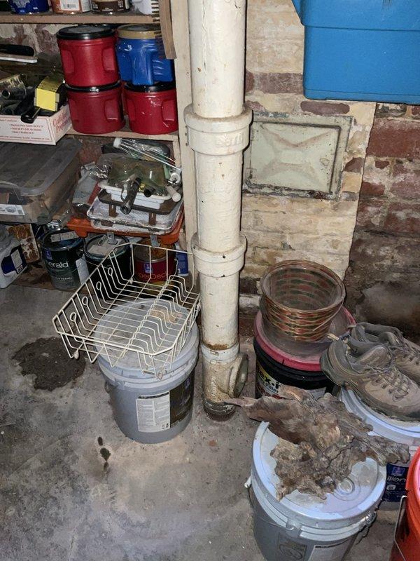 Responded to emergency call for second-floor bathtub drain leaking through kitchen ceiling. Upon arrival, accessed the drain line from the basement utility area and identified the leak source in the vertical drain stack. Performed drain line repair to stop active water infiltration. Inspected surrounding plumbing infrastructure including copper supply lines and drainage system to ensure no additional compromises. Tested repaired drain line under full water flow to verify leak was eliminated and proper drainage function was restored. Advised homeowner to monitor ceiling area for any residual moisture and confirmed all plumbing systems were operating normally before completing service.