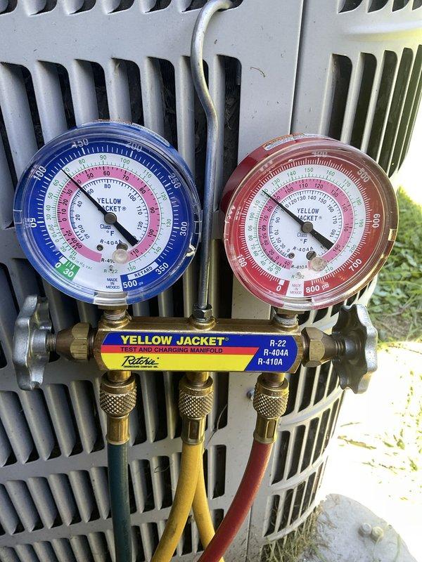 Completed annual preventive maintenance on 6-year-old air conditioning system. Connected manifold gauges to measure refrigerant pressures and verify proper system charge levels for R-410A refrigerant. Inspected outdoor condenser unit, confirmed proper operation of compressor and condenser fan motor. Measured temperature differential across evaporator coil to verify adequate cooling performance. All system parameters found within manufacturer specifications with no deficiencies noted. Unit operating efficiently with no issues requiring correction at time of service.