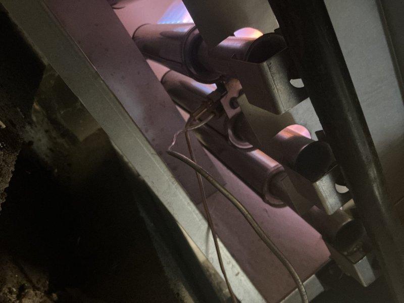 Performed scheduled boiler maintenance and system inspection in response to service call. Documented mechanical components including heat exchanger coils showing age-related oxidation, piping connections, valves, and mounting hardware to verify operational status and identify any required follow-up maintenance.