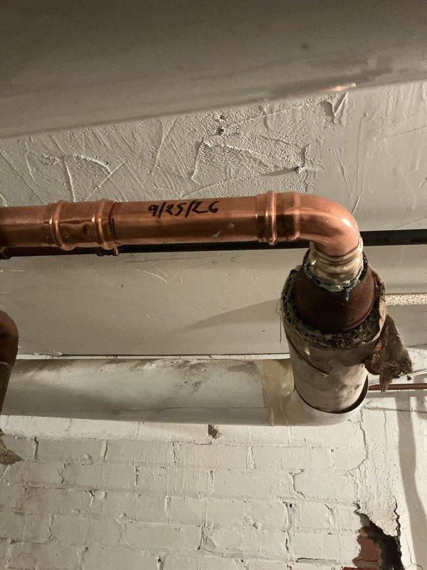 Drained and isolated the hydronic heating system to perform necessary copper pipe repairs. Completed line repairs with proper soldering techniques, then refilled the system and purged all air from the lines to restore proper operation. System tested and confirmed operational with no leaks detected at repair points.